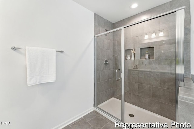 88 Mable Ct Unit 17, Lillington, NC 27546 - full bathroom featuring tile patterned flooring, a shower stall, baseboards, and recessed lighting
