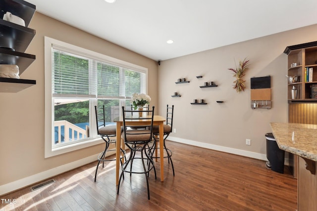 31 River View Ct, Timberlake, NC 27583 - dining space featuring dark wood-style flooring, baseboards, and recessed lighting
