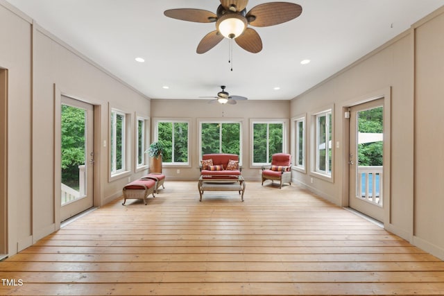 31 River View Ct, Timberlake, NC 27583 - sunroom / solarium featuring healthy amount of natural light, a wooden deck, wood-type flooring, and recessed lighting