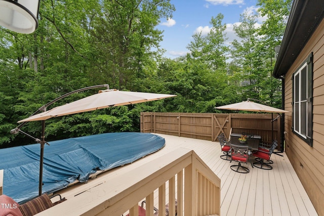 31 River View Ct, Timberlake, NC 27583 - wooden terrace with outdoor dining area