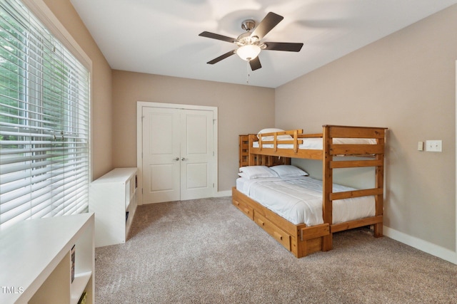 31 River View Ct, Timberlake, NC 27583 - bedroom featuring light colored carpet, a ceiling fan, baseboards, and a closet