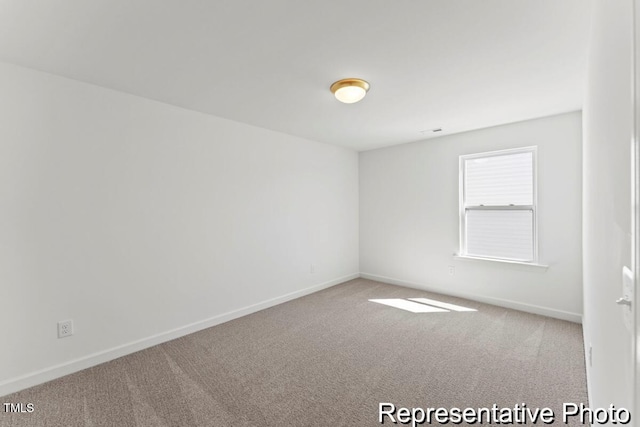 56 Mable Ct Unit 20, Lillington, NC 27546 - empty room featuring carpet and baseboards