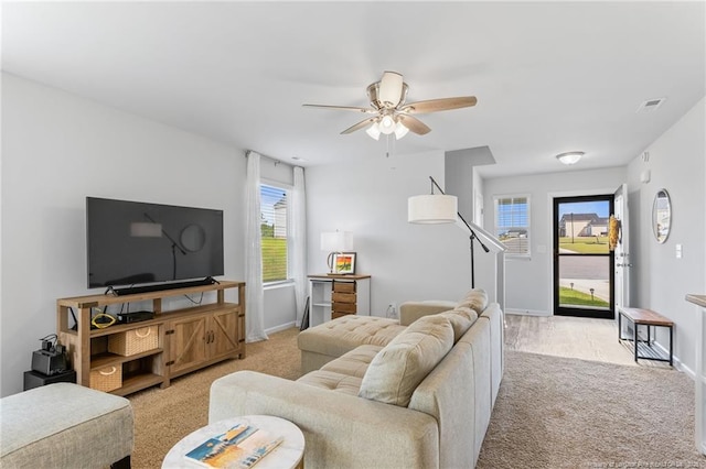 905 Sapphire Stone Ln, Hope Mills, NC 28348 - living room with light colored carpet, ceiling fan, and baseboards
