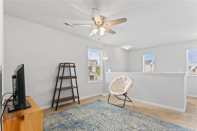 905 Sapphire Stone Ln, Hope Mills, NC 28348 - living area with carpet floors, a ceiling fan, and baseboards