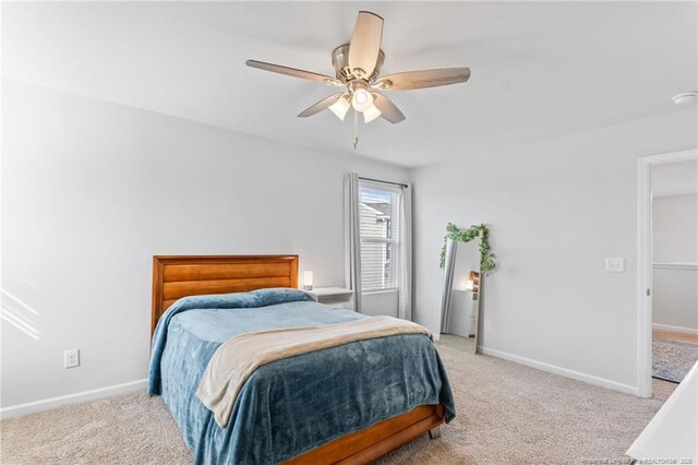 905 Sapphire Stone Ln, Hope Mills, NC 28348 - bedroom featuring light colored carpet, baseboards, and a ceiling fan