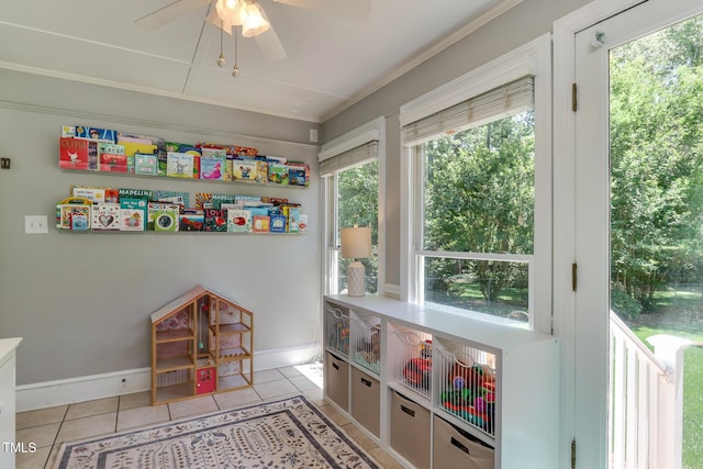 1206 Ivy Ln, Raleigh, NC 27609 - game room featuring ceiling fan, light tile patterned flooring, baseboards, and crown molding