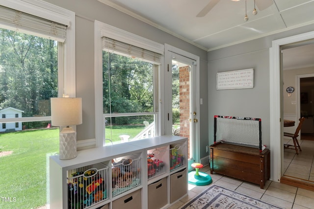 1206 Ivy Ln, Raleigh, NC 27609 - entryway with ornamental molding, healthy amount of natural light, tile patterned flooring, and a ceiling fan