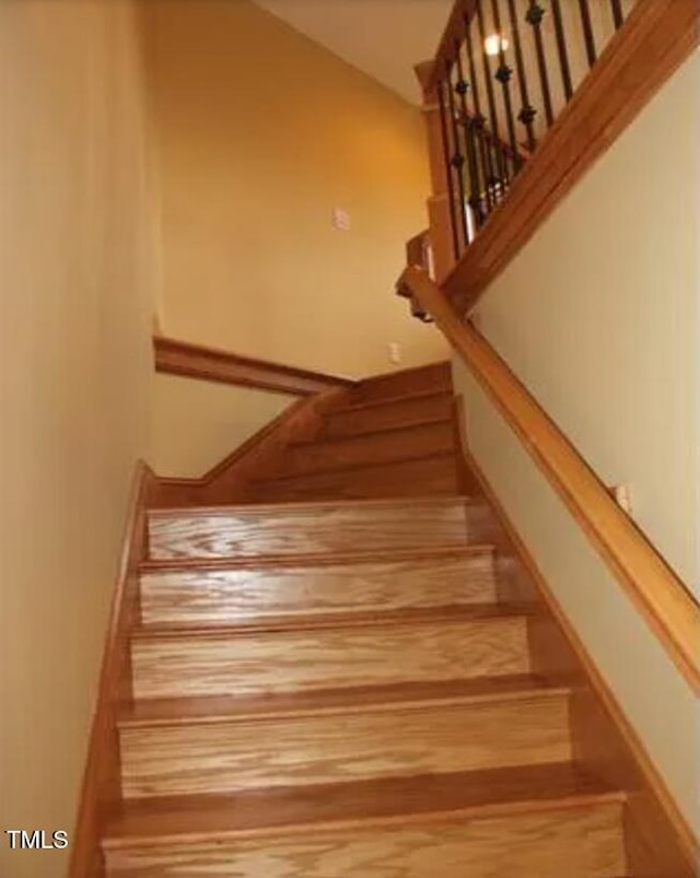 49412 River Run Rd, Albemarle, NC 28001 - stairs featuring wood finished floors