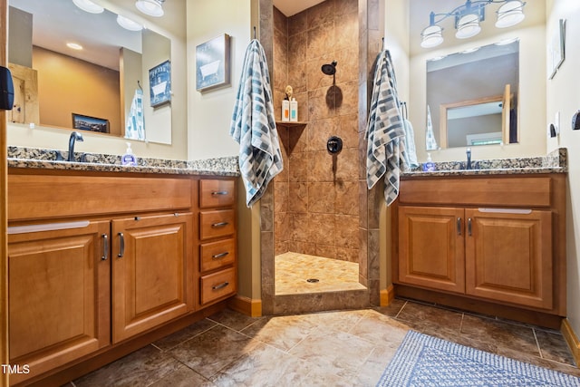 49412 River Run Rd, Albemarle, NC 28001 - full bath with a walk in shower, two vanities, and baseboards