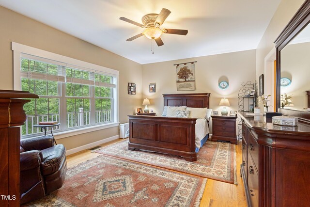 49412 River Run Rd, Albemarle, NC 28001 - bedroom with light wood-style floors and baseboards