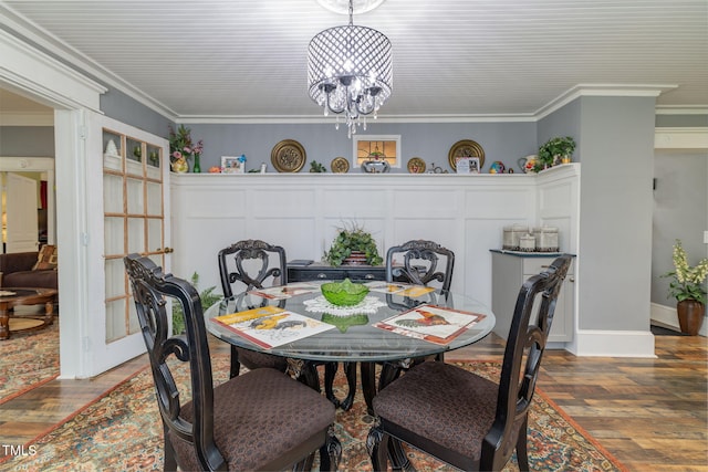 2646 Laurel Mill-Centerville Rd, Louisburg, NC 27549 - dining area with wood finished floors, ornamental molding, and a chandelier