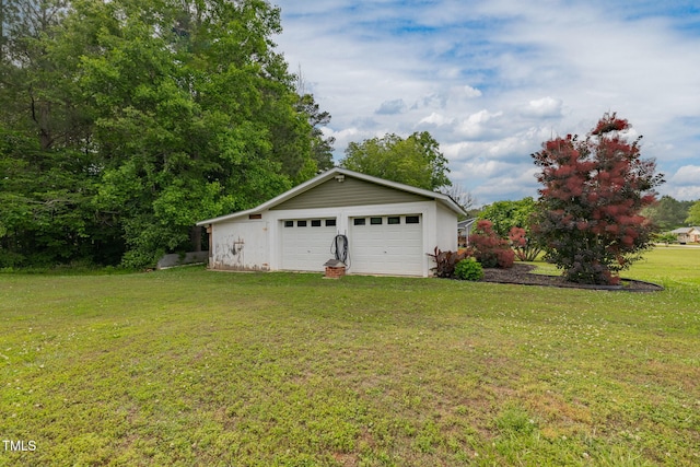 2646 Laurel Mill-Centerville Rd, Louisburg, NC 27549 - view of grassy yard with a garage and an outdoor structure