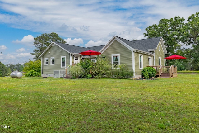 2646 Laurel Mill-Centerville Rd, Louisburg, NC 27549 - view of property exterior featuring a wooden deck and a lawn