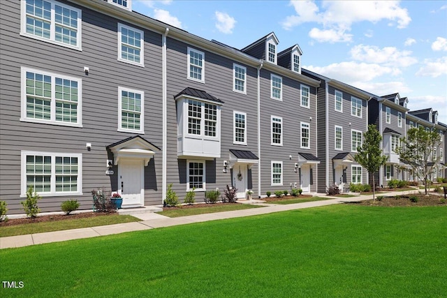 2006 Nola Ln, Durham, NC 27713 - townhome / multi-family property with a front lawn and a residential view