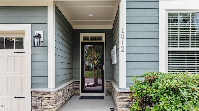 1012 Autumn Meadow Ln, Wake Forest, NC 27587 - doorway to property with stone siding