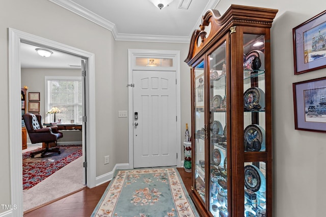 1012 Autumn Meadow Ln, Wake Forest, NC 27587 - foyer featuring dark wood finished floors, crown molding, and baseboards