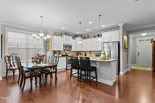 1012 Autumn Meadow Ln, Wake Forest, NC 27587 - dining room featuring a chandelier, dark wood-style floors, baseboards, crown molding, and recessed lighting