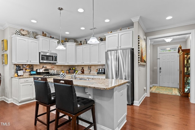 1012 Autumn Meadow Ln, Wake Forest, NC 27587 - kitchen featuring stainless steel appliances, baseboards, white cabinets, dark wood finished floors, and recessed lighting
