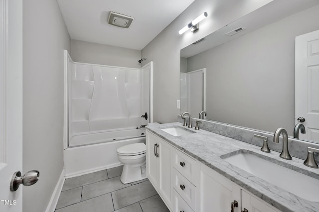 112 S Joyland St, Durham, NC 27703 - full bath featuring toilet, double vanity, tile patterned floors, tub / shower combination, and baseboards