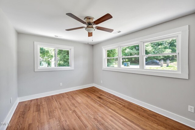 112 S Joyland St, Durham, NC 27703 - spare room with healthy amount of natural light, baseboards, and a ceiling fan