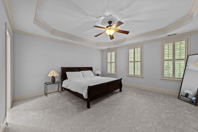 1711 Happiness Hill Ln, Raleigh, NC 27614 - carpeted bedroom with a tray ceiling, ornamental molding, baseboards, and a ceiling fan