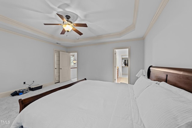 1711 Happiness Hill Ln, Raleigh, NC 27614 - bedroom featuring crown molding, a raised ceiling, a ceiling fan, carpet flooring, and connected bathroom
