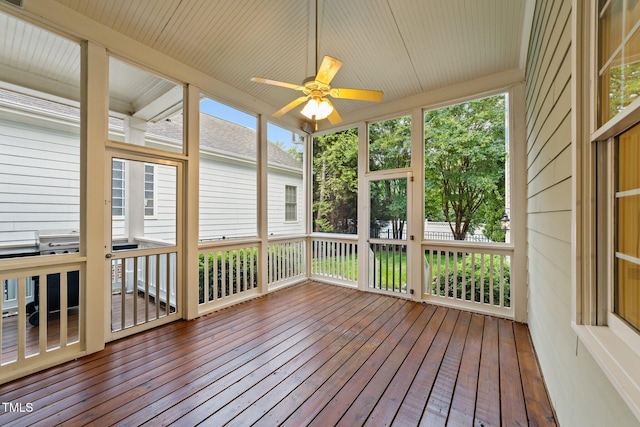1711 Happiness Hill Ln, Raleigh, NC 27614 - unfurnished sunroom featuring a deck, wood-type flooring, and a ceiling fan