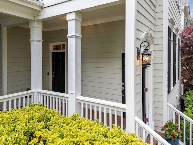 1711 Happiness Hill Ln, Raleigh, NC 27614 - property entrance with a porch