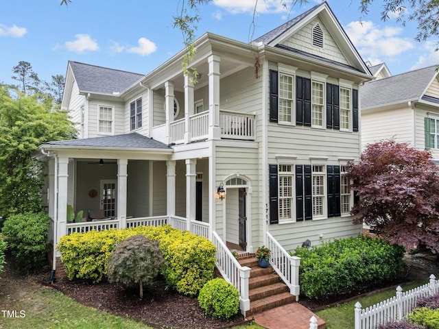 1711 Happiness Hill Ln, Raleigh, NC 27614 - greek revival house featuring a balcony, a porch, and roof with shingles