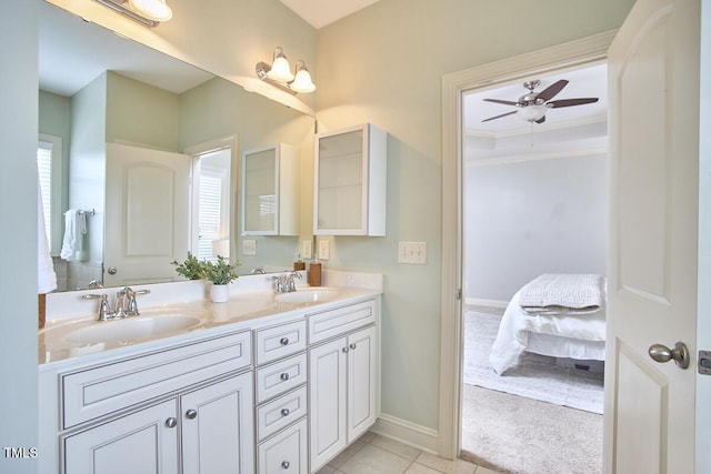 808 Historian St, Raleigh, NC 27603 - bathroom featuring double vanity, ensuite bathroom, crown molding, tile patterned floors, and ceiling fan