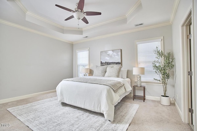808 Historian St, Raleigh, NC 27603 - bedroom featuring carpet flooring, a raised ceiling, crown molding, and ceiling fan