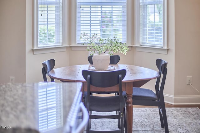 808 Historian St, Raleigh, NC 27603 - dining space with healthy amount of natural light and wood finished floors
