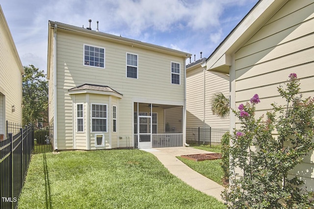 808 Historian St, Raleigh, NC 27603 - rear view of house featuring a sunroom and a fenced backyard