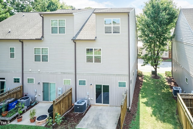 2808 Carter Finley Pl, Raleigh, NC 27606 - rear view of house with a patio, a fenced backyard, and roof with shingles