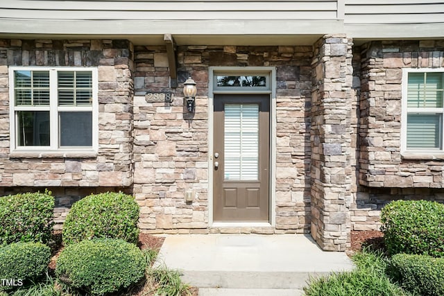 2808 Carter Finley Pl, Raleigh, NC 27606 - view of exterior entry featuring stone siding