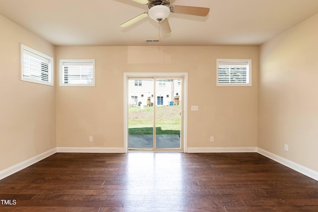 2808 Carter Finley Pl, Raleigh, NC 27606 - empty room with healthy amount of natural light, dark wood-style flooring, and ceiling fan
