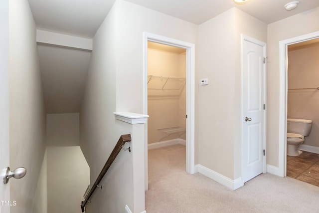 2808 Carter Finley Pl, Raleigh, NC 27606 - corridor with an upstairs landing and light carpet