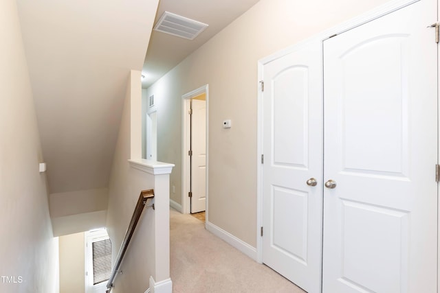 2808 Carter Finley Pl, Raleigh, NC 27606 - hallway with an upstairs landing and light colored carpet