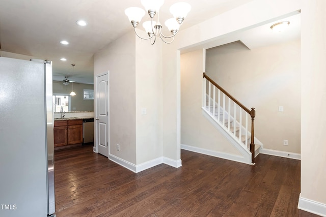 2808 Carter Finley Pl, Raleigh, NC 27606 - unfurnished dining area with dark wood finished floors, recessed lighting, stairway, a chandelier, and a ceiling fan