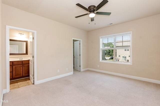 2808 Carter Finley Pl, Raleigh, NC 27606 - unfurnished bedroom featuring light colored carpet and connected bathroom