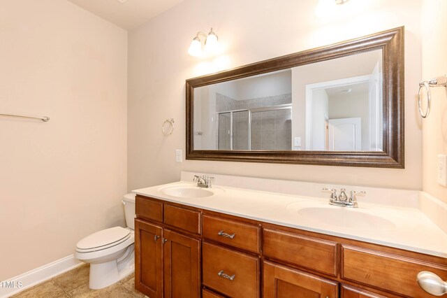 2808 Carter Finley Pl, Raleigh, NC 27606 - bathroom with double vanity, a tile shower, and tile patterned floors