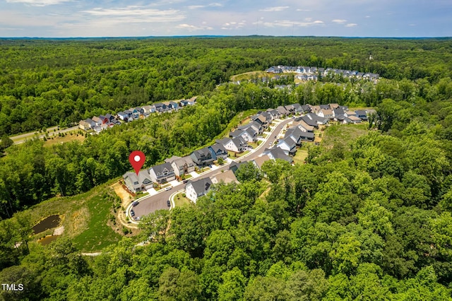 386 Monteith Dr, Chapel Hill, NC 27516 - aerial perspective of suburban area with a heavily wooded area