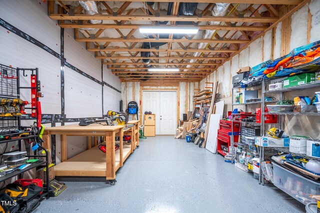 386 Monteith Dr, Chapel Hill, NC 27516 - garage featuring a workshop area