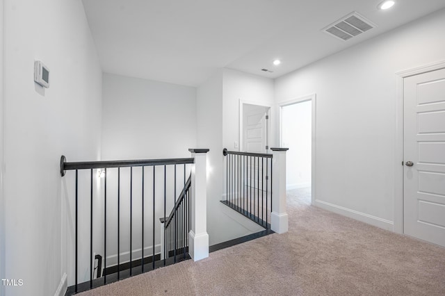 386 Monteith Dr, Chapel Hill, NC 27516 - hallway featuring an upstairs landing, carpet flooring, recessed lighting, and baseboards