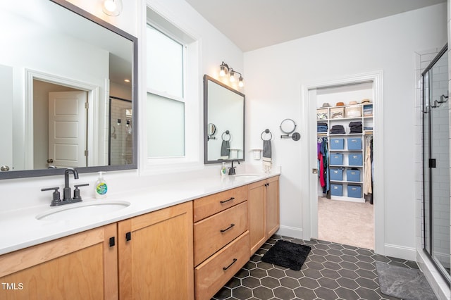 386 Monteith Dr, Chapel Hill, NC 27516 - full bath with double vanity, a stall shower, a walk in closet, and tile patterned floors