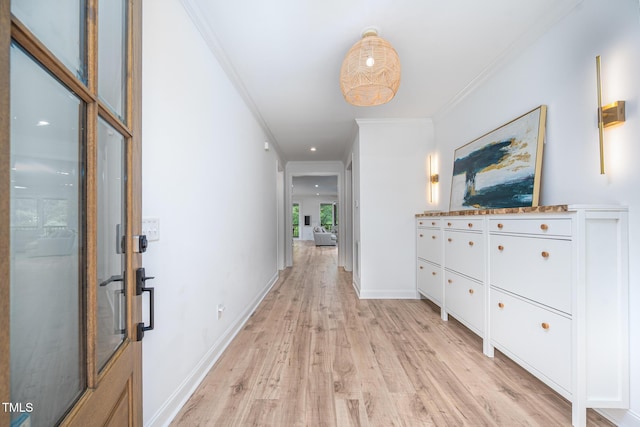386 Monteith Dr, Chapel Hill, NC 27516 - hallway featuring light wood-style flooring, crown molding, and baseboards