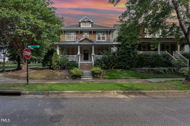 2201 Karns Pl, Raleigh, NC 27614 - american foursquare style home featuring a porch and stairway