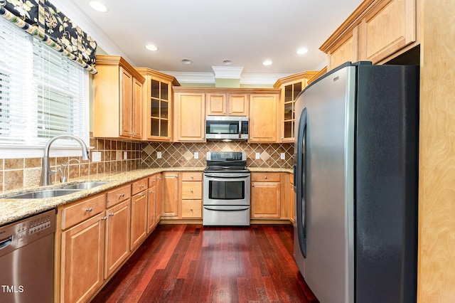 2201 Karns Pl, Raleigh, NC 27614 - kitchen with stainless steel appliances, crown molding, light stone counters, dark wood finished floors, and tasteful backsplash