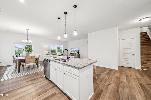 149 Cribbs Ln, Middlesex, NC 27557 - kitchen featuring a sink, stainless steel dishwasher, light wood-type flooring, and a chandelier