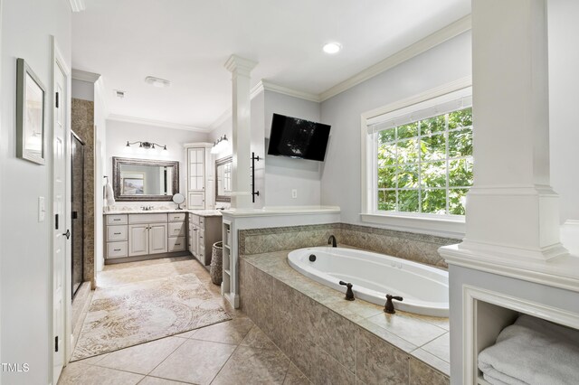 101 Eden Glen Dr, Holly Springs, NC 27540 - bathroom with vanity, a shower stall, a garden tub, ornamental molding, and tile patterned floors